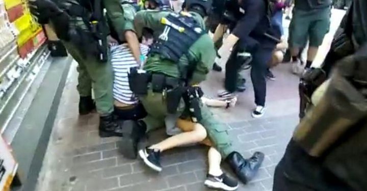 Hong Kong police criticised for tackling 12 year-old during protests