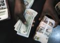 Naira declines by 51.95% despite CBN’s defense measures