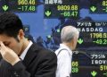 Asia Stocks Mixed as Commodites Drop; Yields Dip