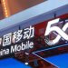 China Mobile shares rise in Shanghai debut after US exit