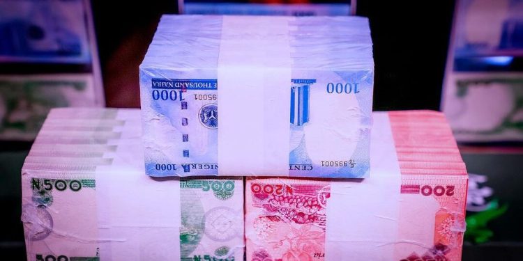 N165bn back in banks as Buhari unveils redesigned Naira