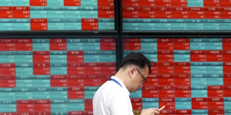 Asian Markets Slip as US-China Trade Tensions Escalate; Gold and Oil Rise