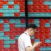 Asian Markets Slip as US-China Trade Tensions Escalate; Gold and Oil Rise