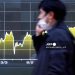Asian Stocks Rally as Dollar Slides to Four-Year Low, Gold Hits Record