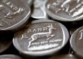 Rand Strengthens Near 16-per-Dollar on Gold Surge Ahead of SARB Meeting