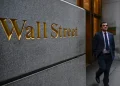 Wall Street Dips as Energy Prices Surge and Central Banks Hold Rates