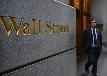 Wall Street Dips as Energy Prices Surge and Central Banks Hold Rates