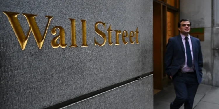 Wall Street Dips as Energy Prices Surge and Central Banks Hold Rates
